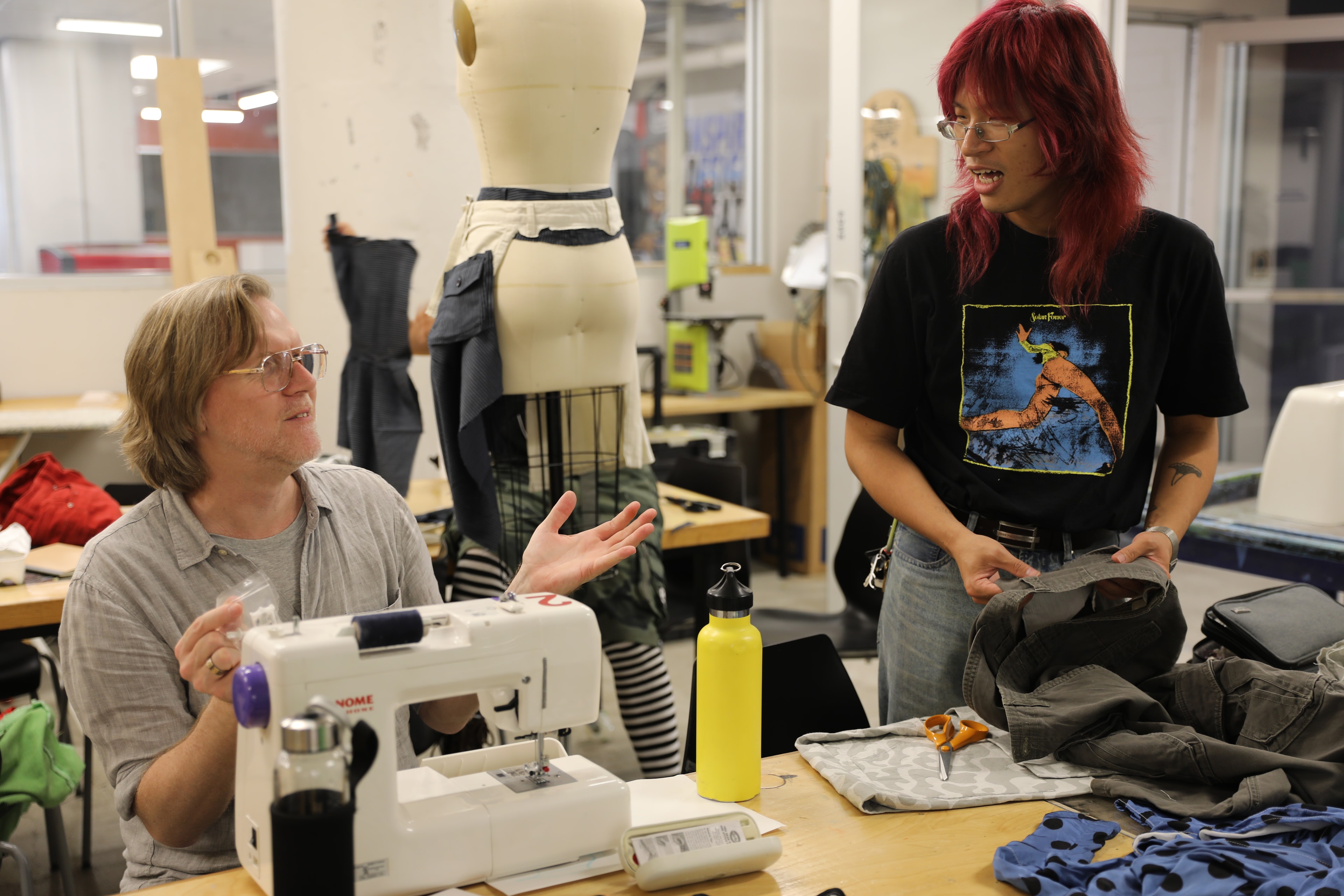 Good Clothes Community Founder, Benjamin Mach, sharing ideas with Community Member, Roy.
